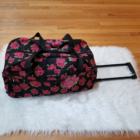Betsey Johnson Handbags - BETSEY JOHNSON Carry-On Black Rolling Ruffle Weekend Travel Bag With Red Roses.